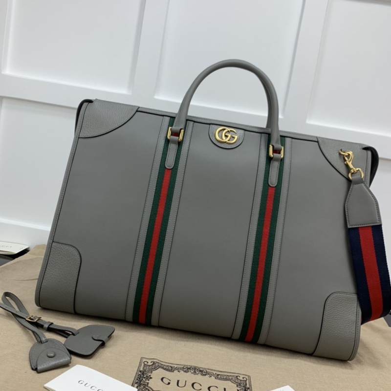 G*u*i shopping bags